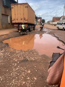 Kampala Pothole Exhibition points at the need to adopt Chinese development Strategy